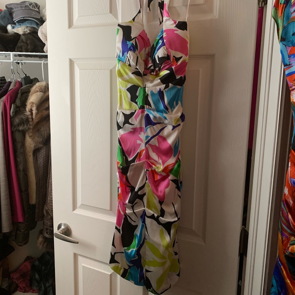 A gorgeous body fitted dress both open back